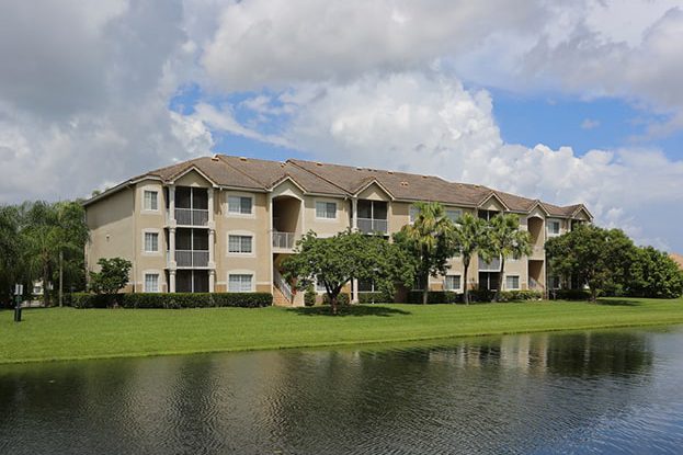 Homes along lake at San Michele Andros Isles West Palm Beach, A Kolter Group Property