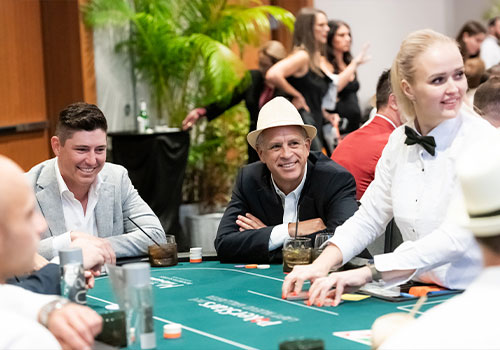 Bobby Julien and others playing poker at Havana Nights Charity